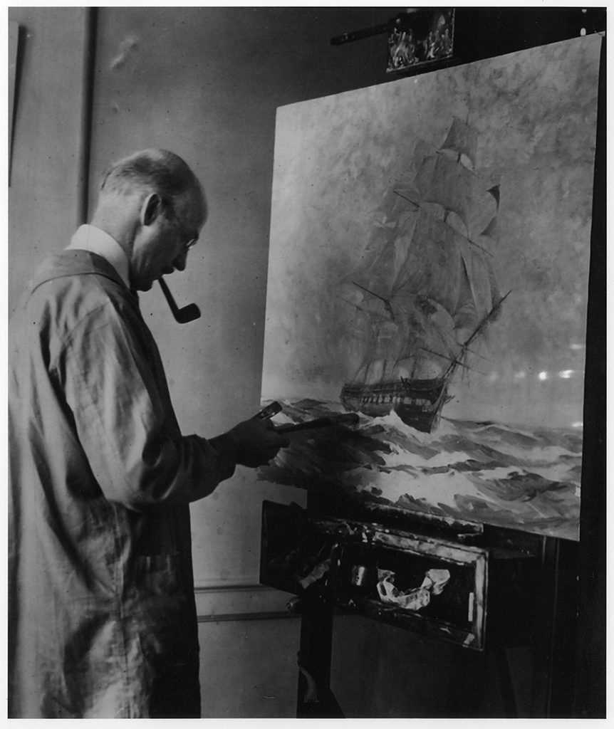 Gordon Grant giving the final touches to his painting of "Old Ironsides" before presenting it to the White House. [Source unknown]